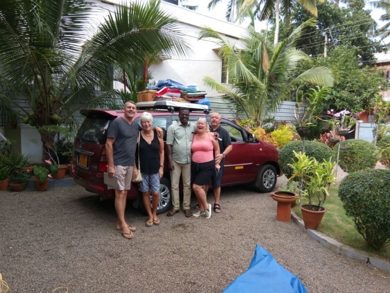 Other image for Couple help out India flood victims